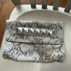 Snakeskin looking studded bag!